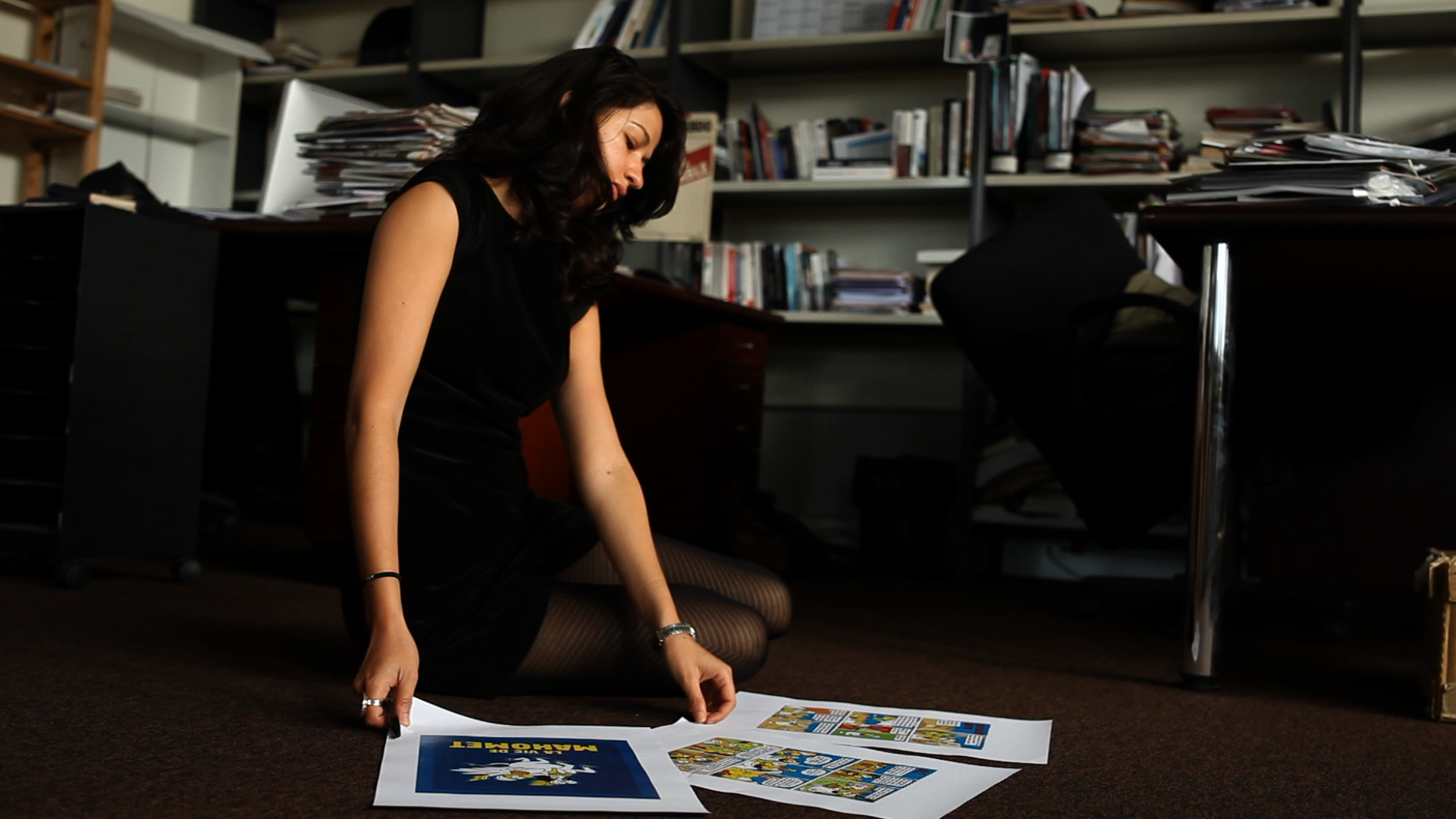 Zineb El Rhazoui working in the Charlie Hebdo Offices. Photo: Savage Film. Photo.