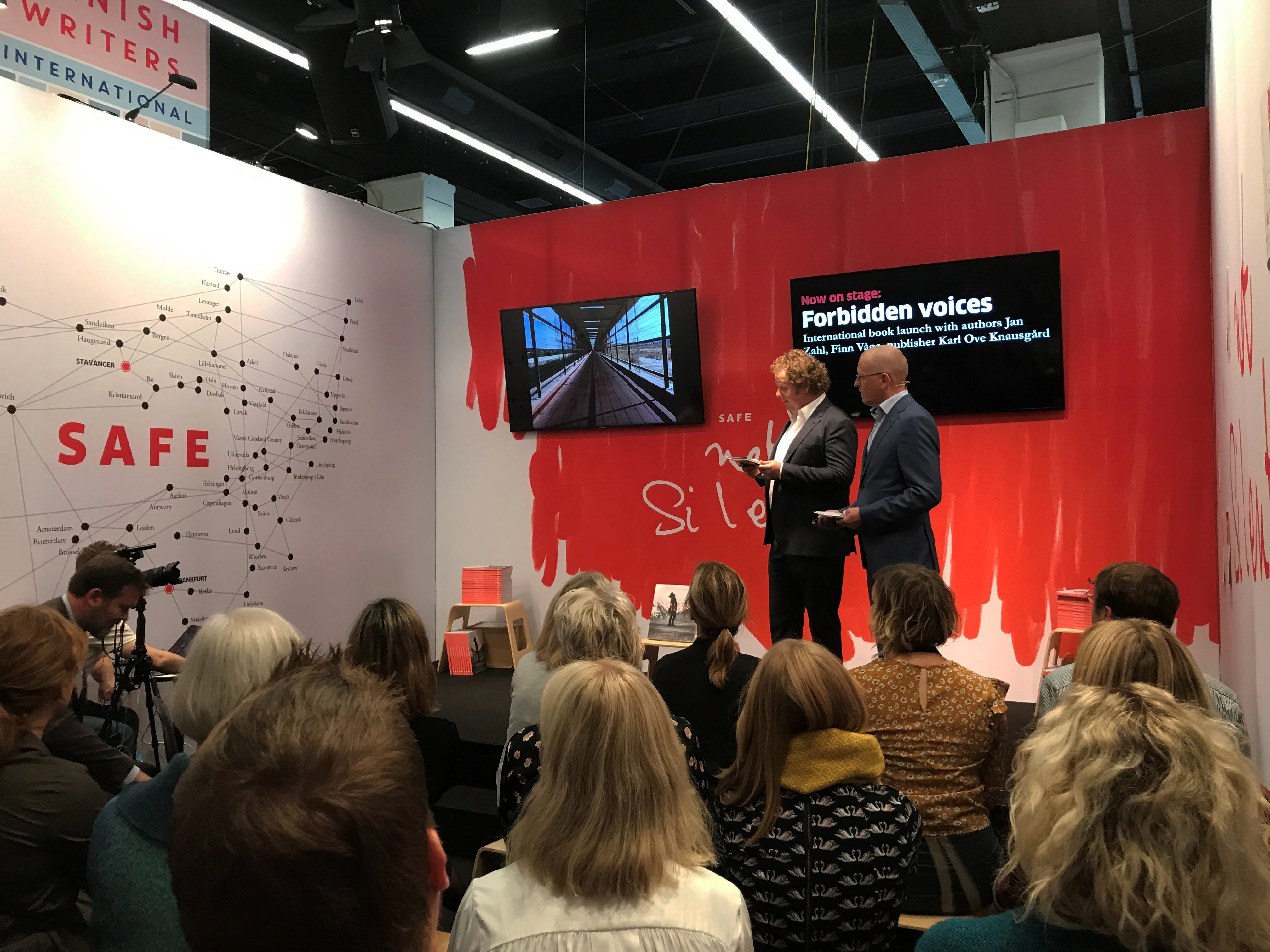 Stavanger Aftenblad's journalists and authors of Forbidden voices, Jan Zahl and Finn E. Våga, presents the project to the audience during the booklaunch at ICORN's stand at the Frankfurt Book Fair 2019. Photo.
